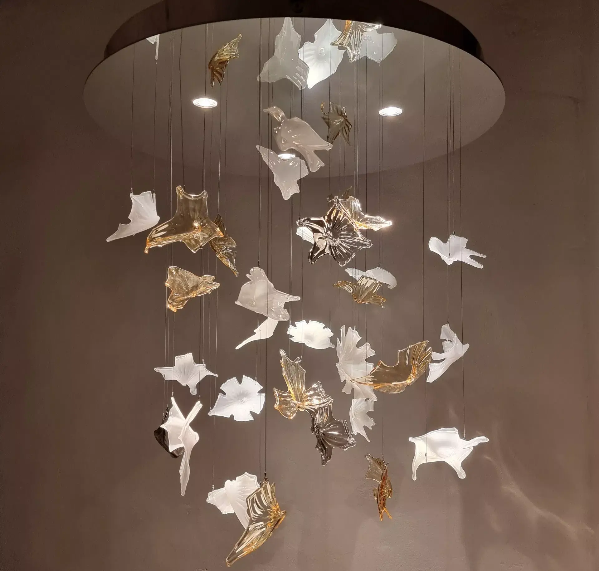 Mirror surface base chandelier reflects everything