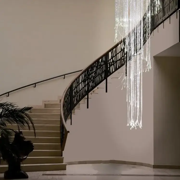 Fibre optic modern chandelier in private staircase