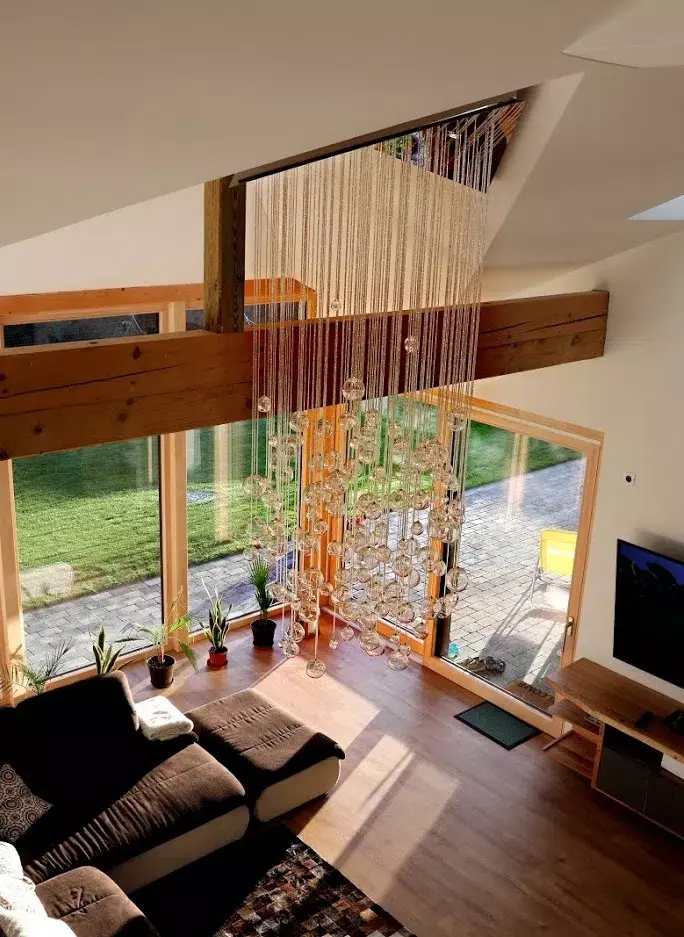 Aquila fibre optic chandelier on sloped ceiling during daytime