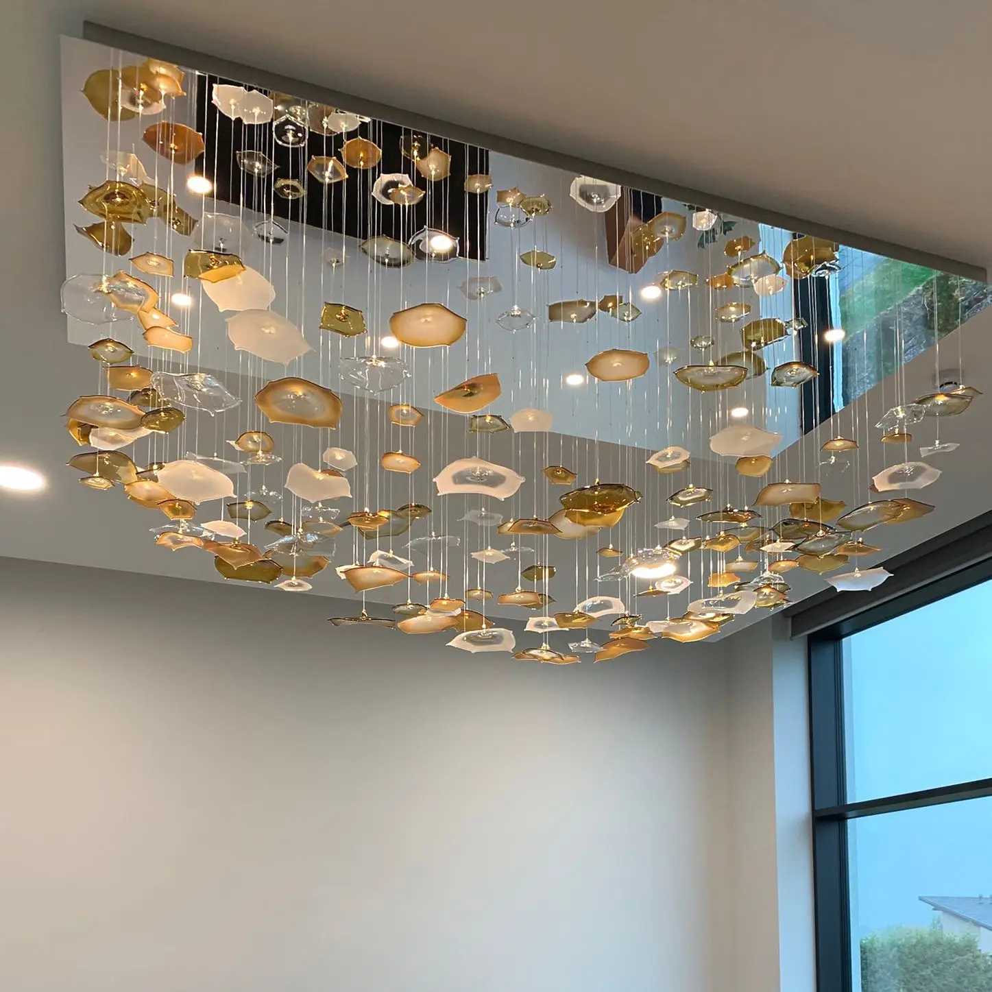 Luxury organic shape glass fibre optic chandelier in seaside villa