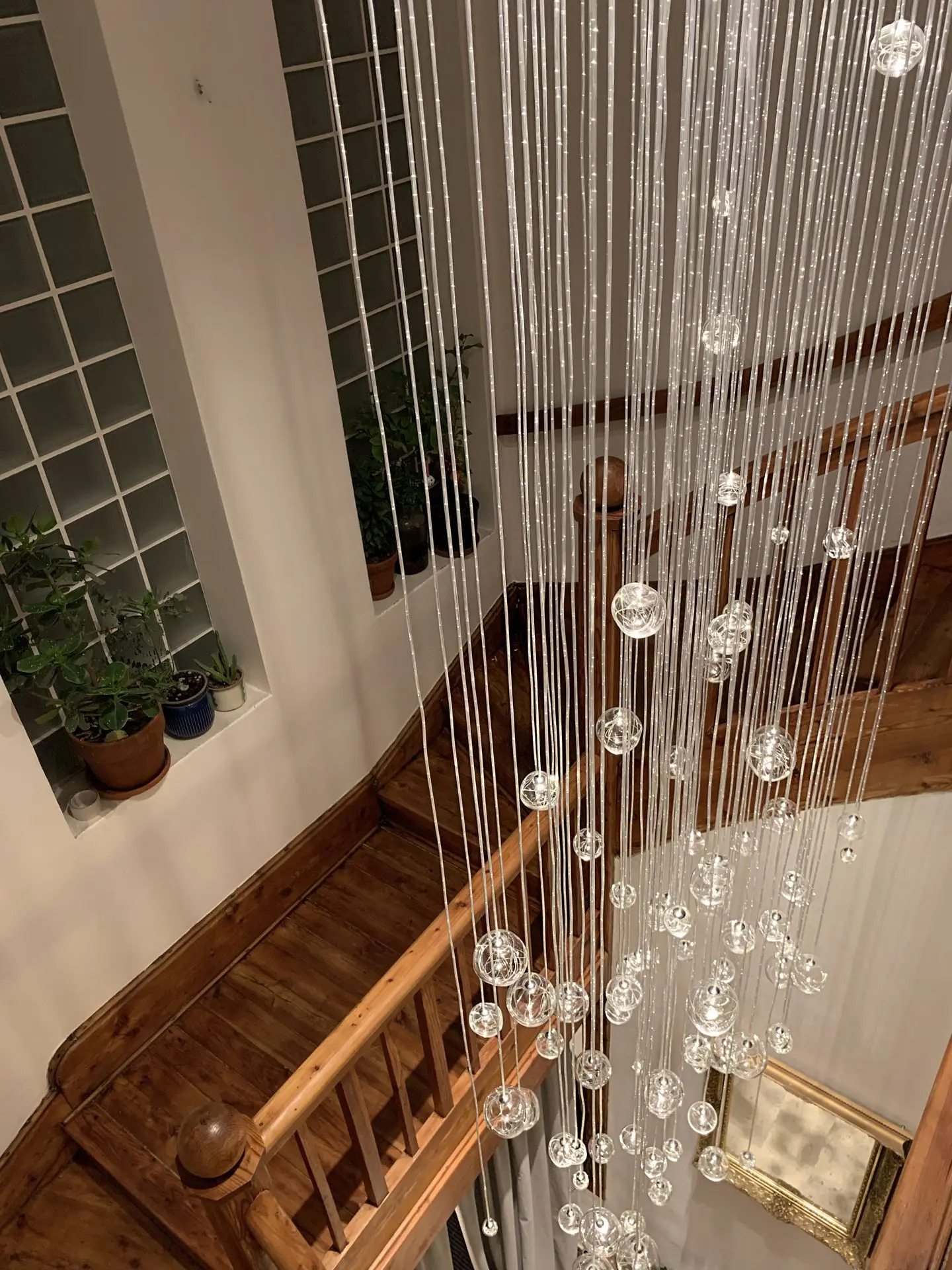 Aquila is fiber optic chandelier with main power LED lighting from base. Fibre optics are great for mood lighting, while miniature LED frameless spotlights are great for functional lighting. Ideal for tall spaces