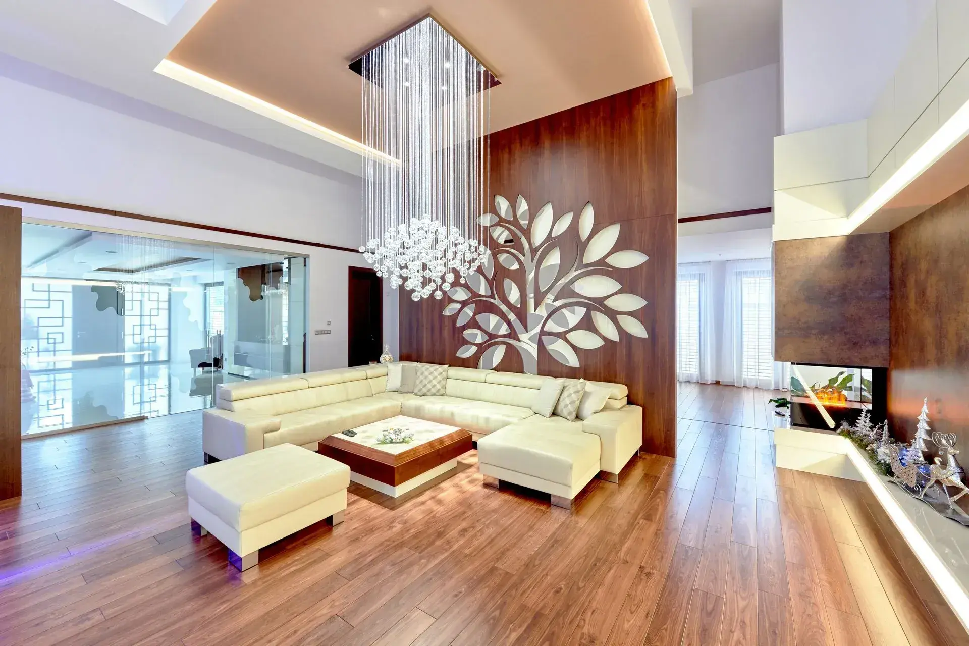 Tall livingroom design and modern chandelier