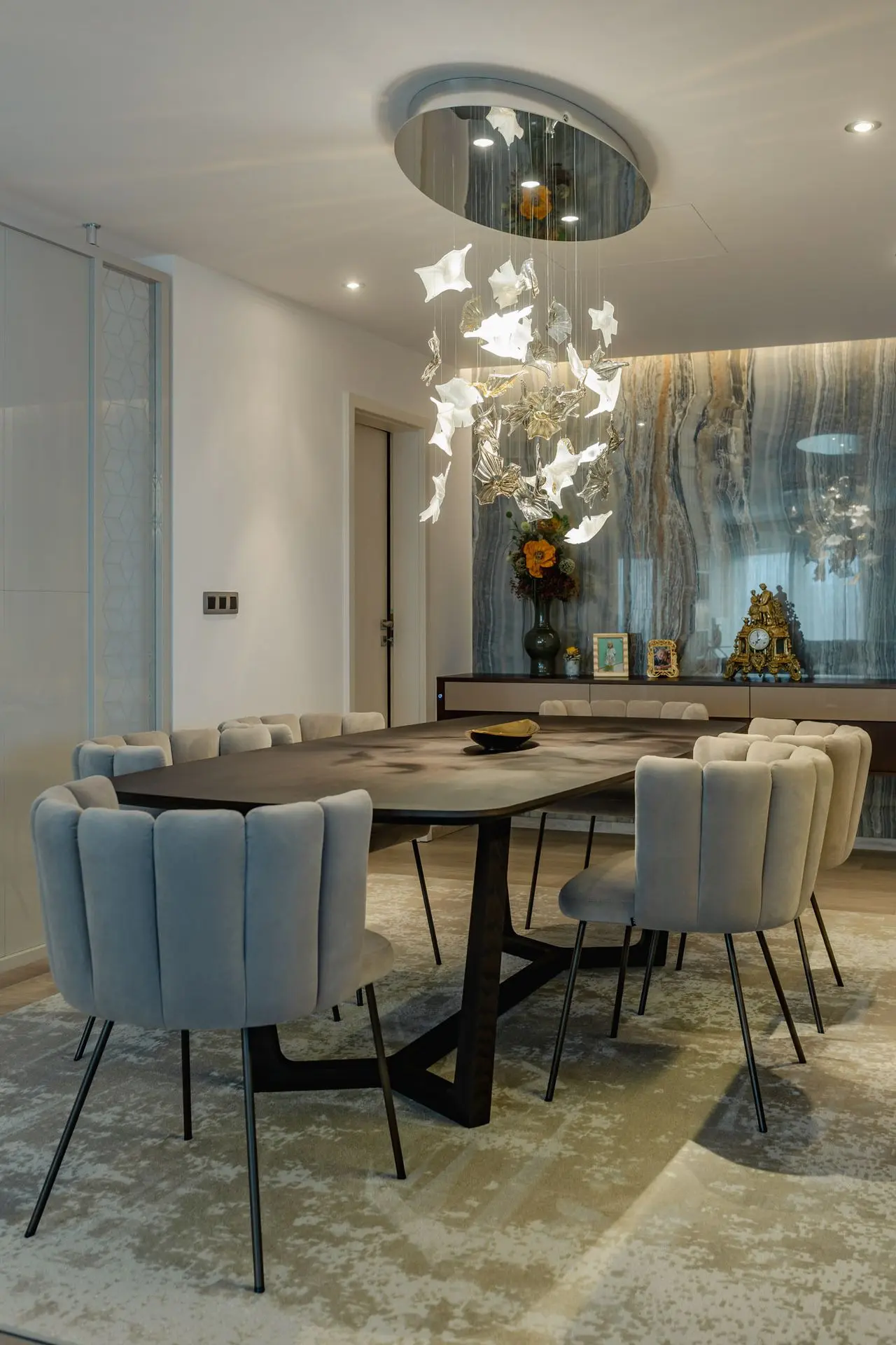 Elegant chandelier in a modern kitchen and above dining table