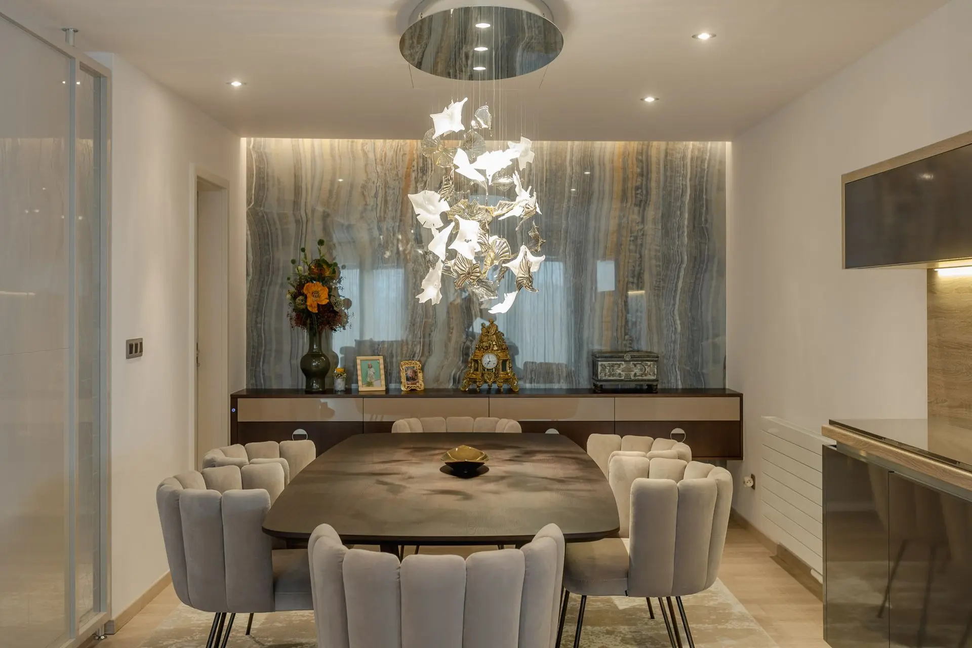 Dining table area with elliptical lighting LED