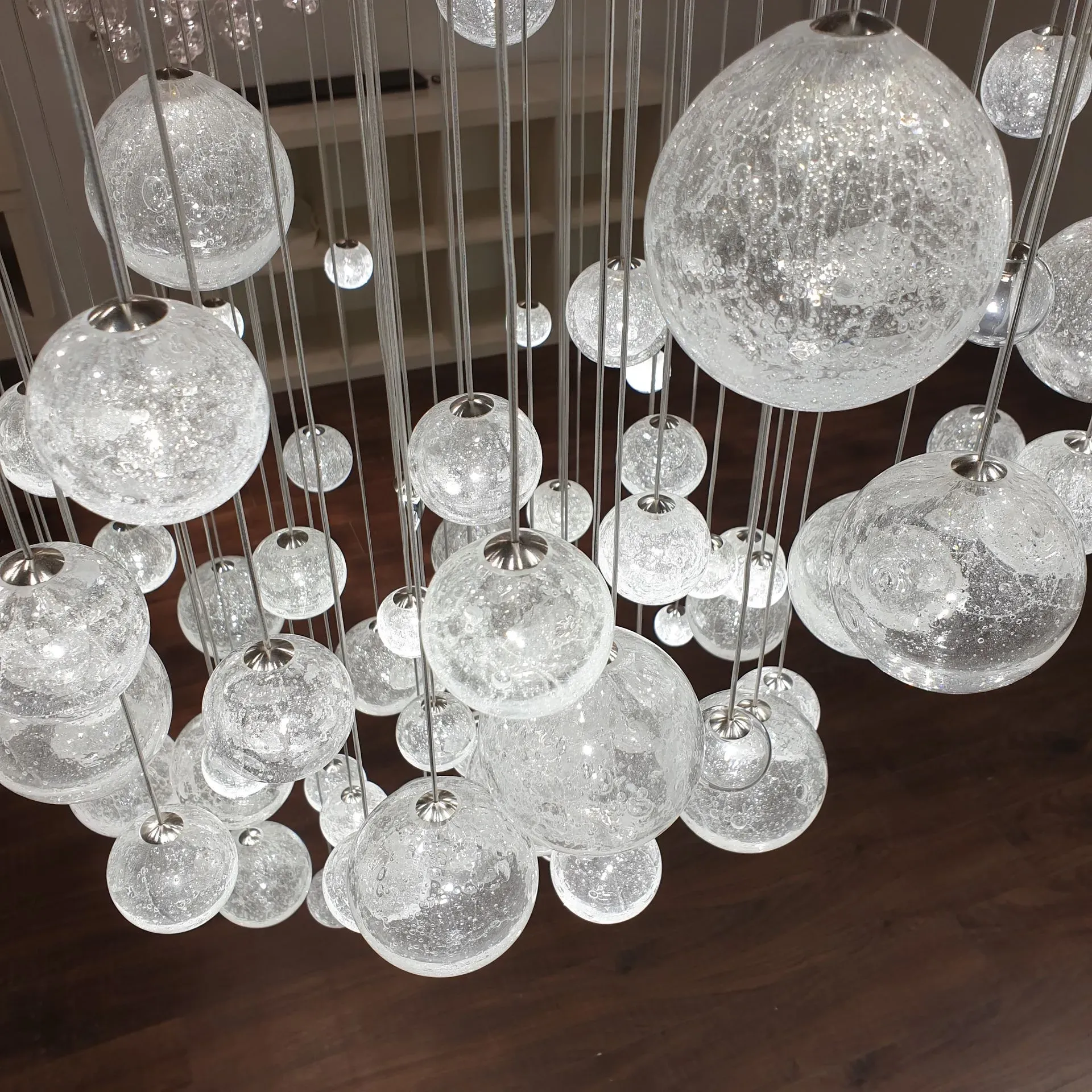 ELUDA modern design chandelier made of glass and LED modules for livingroom, bedroom, hotel large interior spaces. TOP view