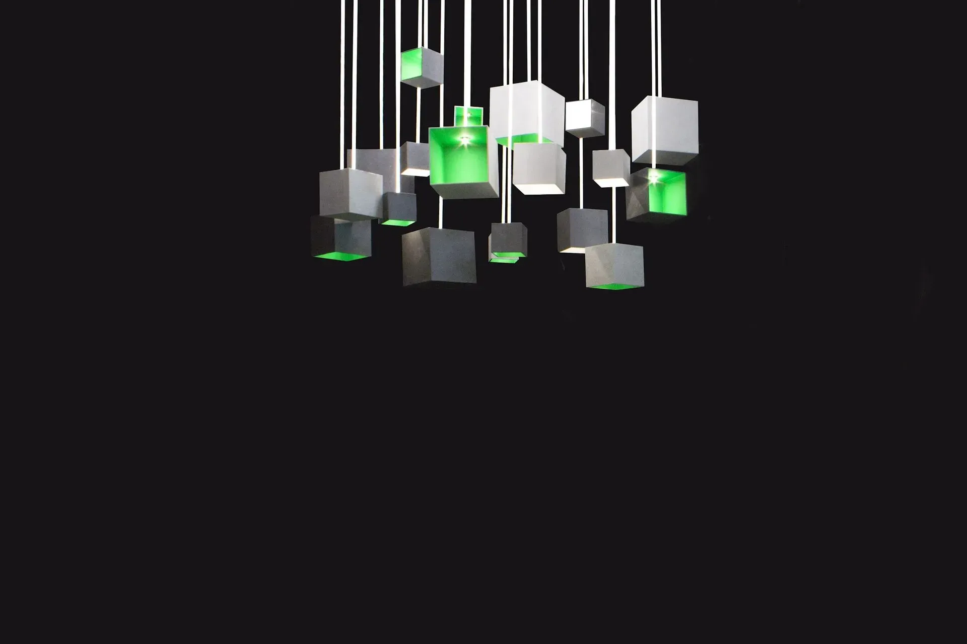 Green GRAIN chandelier for modern interior with minimalistic concrete design made of fibre optic showoom