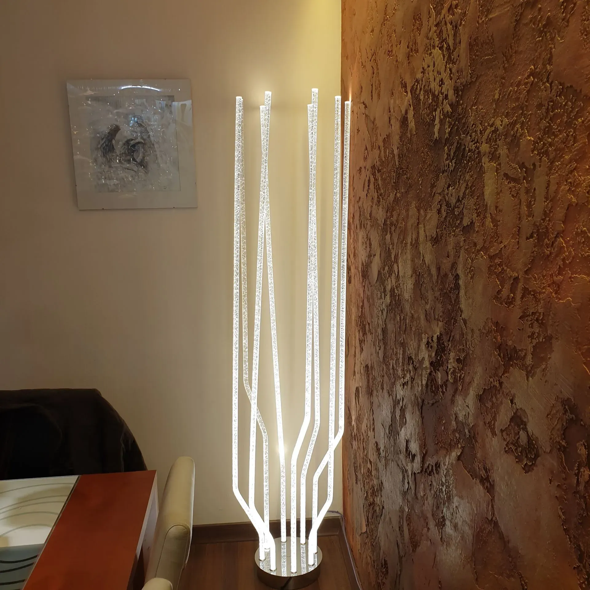 Showroom TREA floor lamp made of fibre optic light rods 2m tall lamp in interior